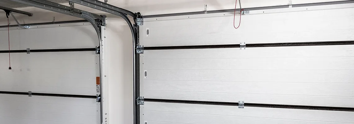 Fix Folding Garage Door Jerking in Rockford, Illinois