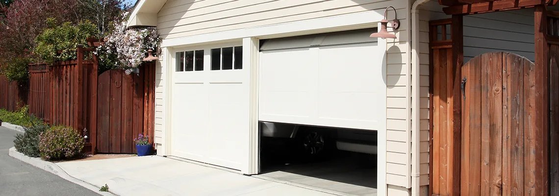 Fix Metal Garage Door Jerking in Rockford, Illinois